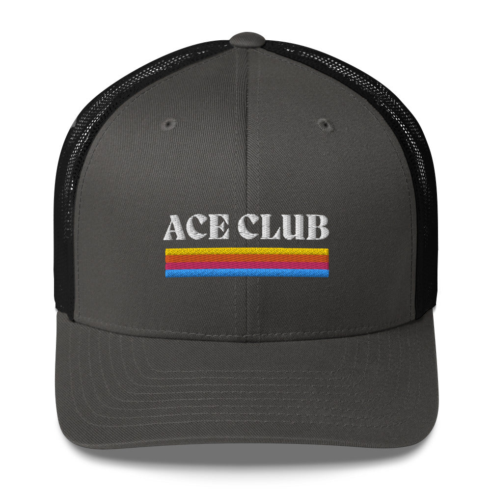 grey and black trucker hat with colorful stripes and the text Ace Club on the front of it. 